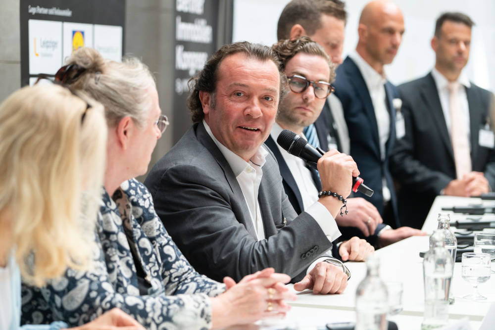 Das Panel Wohnen beim Berliner Immobilienkongress 2023